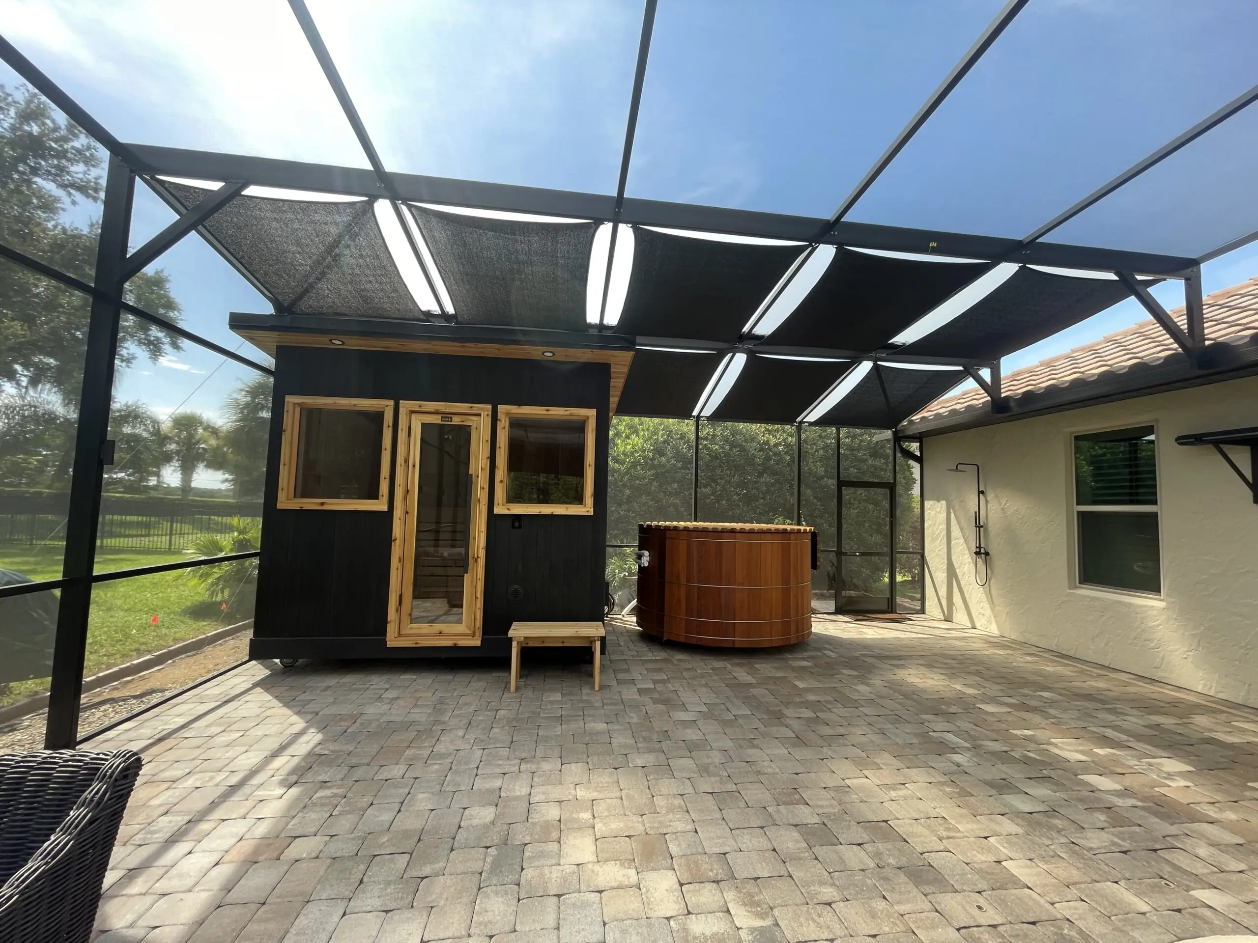 Black overhead shade sails in Monteverde FL