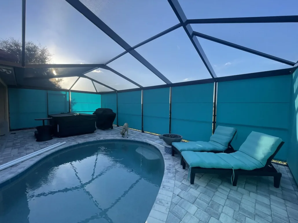 Aruba Sunbrella Roll-down shades with Aluminum Valance in pool enclosure in Winter Haven FL